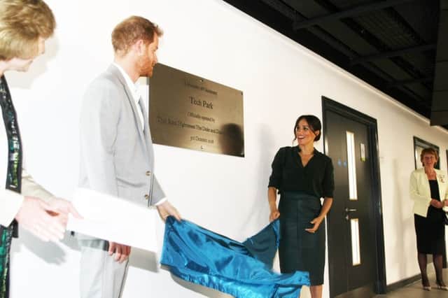 DM18100164a.jpg. Harry and Meghan, the Duke and Duchess of Sussex, open the University of Chichester's Tech Park. Photo by Derek Martin Photography SUS-180310-145902008
