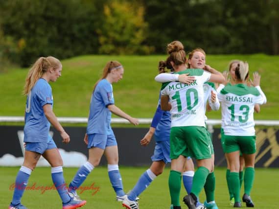 Chi City Ladies celebrate a goal at Loughborough, where they won 1-0