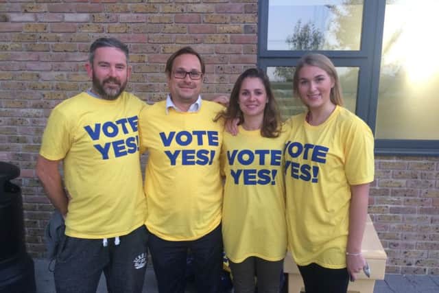 Supporters in their Yes to IKEA t-shirts