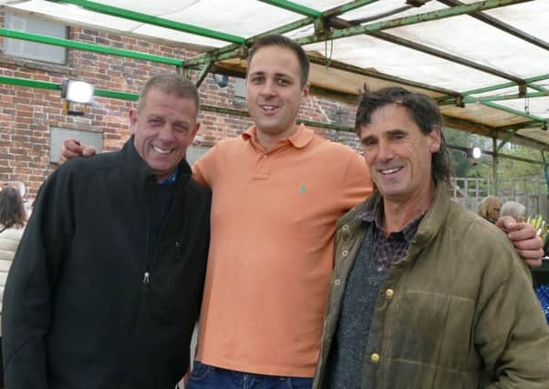 Steve Moore with new owners Peter and Bradley
