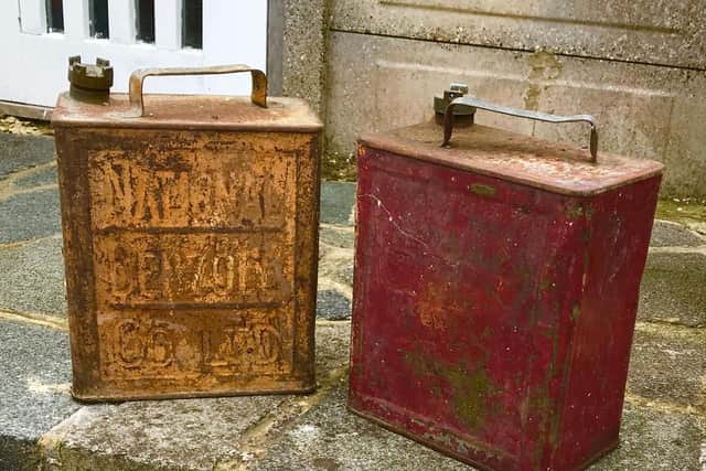 Oil cans before their restoration