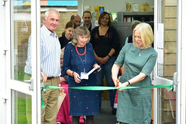 Doing the honours ... Helen Peters cuts the ribbon to officially open Ringmer Village Library