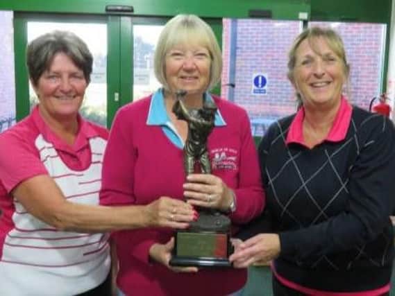 Moore & Peace trophy winner Gay Hadley (centre) with Janet Moore and Fran Peace