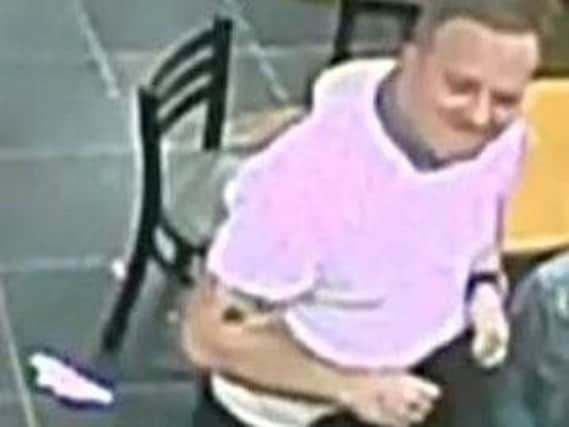 Police are attempting to trace this man in connection with the assault. Photo: Sussex Police