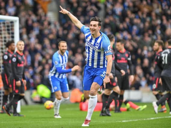 Lewis Dunk celebrates scoring against Arsenal last season. Picture by PW Sporting Photography
