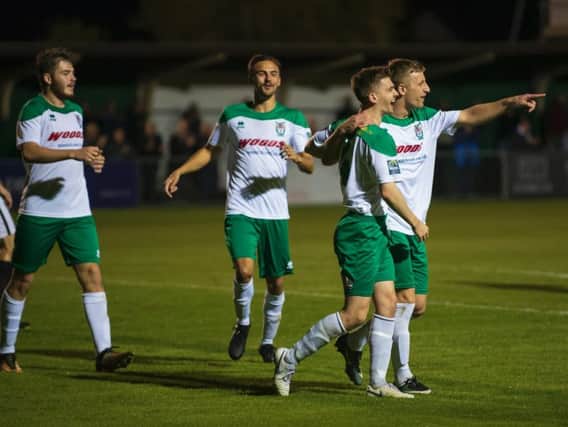 The Rocks celebrate a goal in their 8-0 drubbing of Burgess Hill last week / Picture by Tommy McMillan