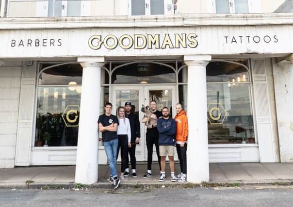Pictured are Alfie, Yas, Ben, Connor, Luke, Chris outside the new premises