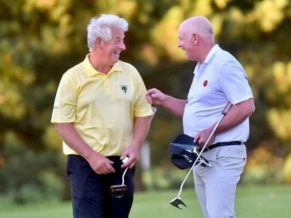 All smiles at the end of the game  Lancashires Bryan Hughes (right) and Nottinghamshires Ian Gretton. Image copyright Leaderboard Photography