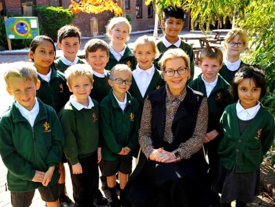 Headteacher Candida Reece with some of the pupils at London Meed Primary School. Photo by Steve Robards