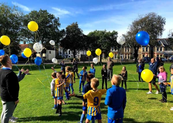 Releasing balloon on Southwick Recreation Ground in memory of Tabias Levene