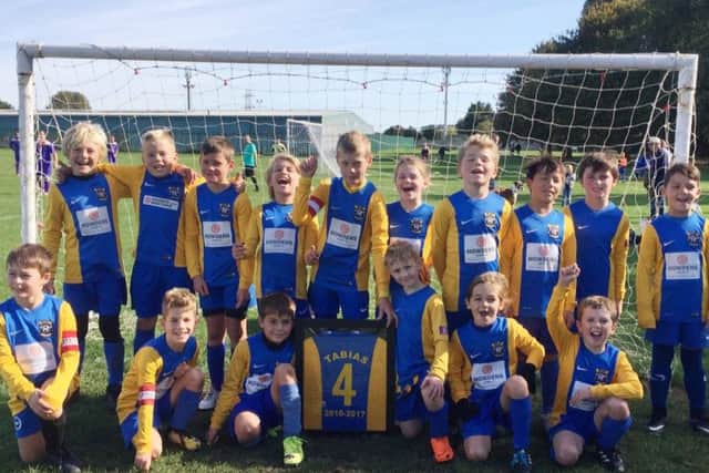 The U9 Blues remember their former teammate