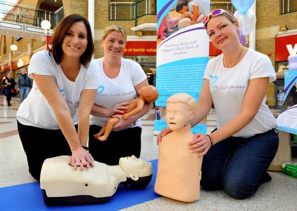 Claire Huggett, Tina Fox and Barbara Stanley (founder) of Little Life Savers at the Market Place Shopping Centre in Burgess Hill. Picture: Steve Robards