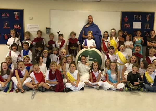 Sir Teachalot' Ashley Holt visited Cranleigh Prep School to experience life in Ancient Greece' SUS-181015-123941001