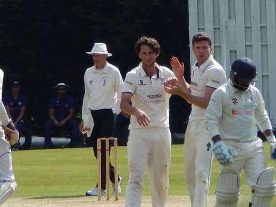 Fynn Hudson-Prentice celebrates a wicket against Wanstead in the National Cup semi-final in 2017
