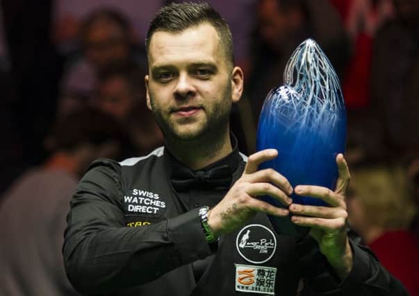 Jimmy Robertson clutches the European Masters trophy in Belgium on Sunday. Picture courtesy World Snooker/Tai Chengzhe