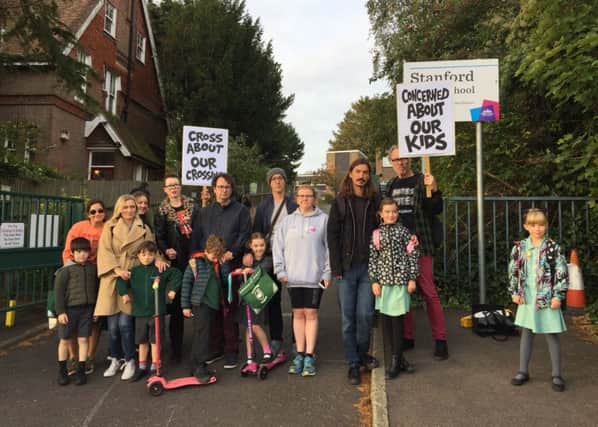 Parents campaigning outside Stanford Infants and Junior schools to get a new lollipop lady