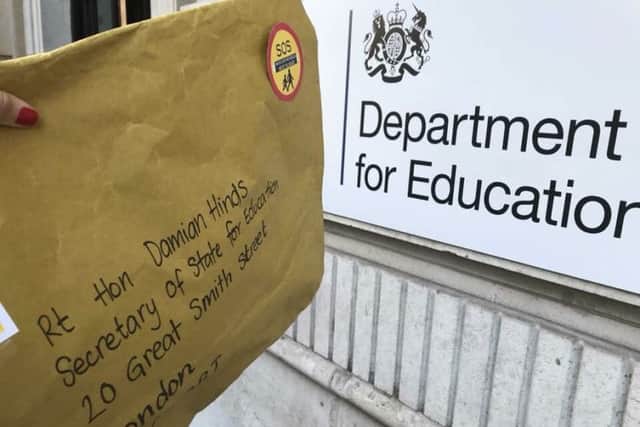 More than 500 postcards written by West Sussex parents and school children were delivered to the Secretary of State for Education today demanding fair funding for local schools.