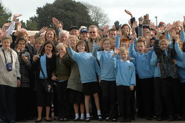 The crowd, including Buckingham Park Primary School pupils, gathered to welcome Prince Andrew at the official reopening of the Old Toll Bridge in Shoreham