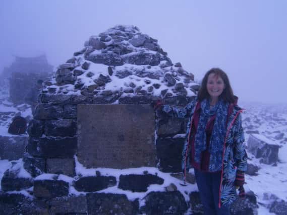 Teresa Donald at the summit of Ben Nevis after having a hip replacement at Nuffield Health Chichester Hospital