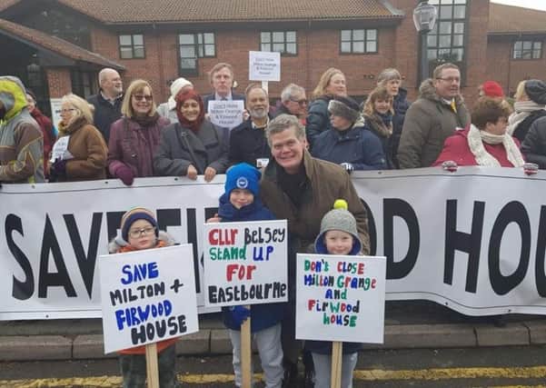 Stephen Lloyd MP with children at a protest against the care home closures