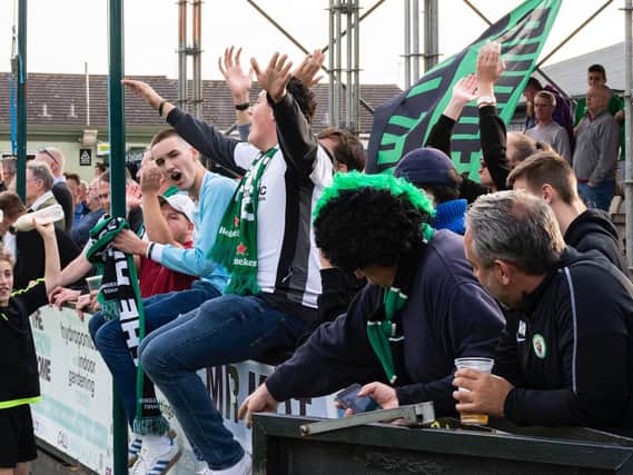 Burgess Hill Town fans celebrate a goal. Picture by Chris Neal