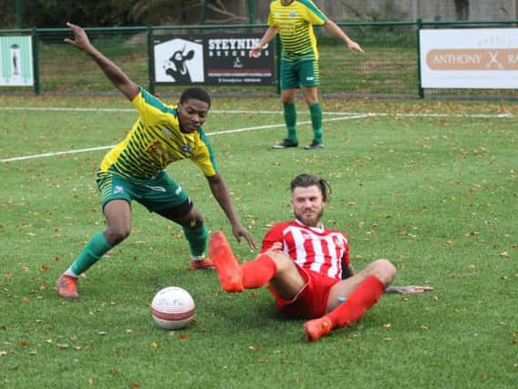 Action from Steyning's win against Walton & Hersham. Picture by Derek Martin