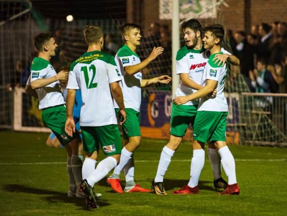 Bognor's young team - pictured celebrating a goal againt Burgess Hill - are winning praise from boss Jack Pearce and coach Robbie Blake / Picture by Tommy McMillan