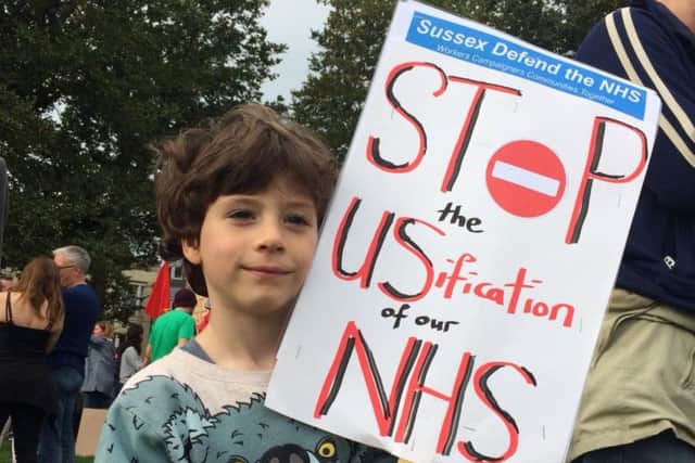 Five-year-old Joe Clifton joins the march in Brighton