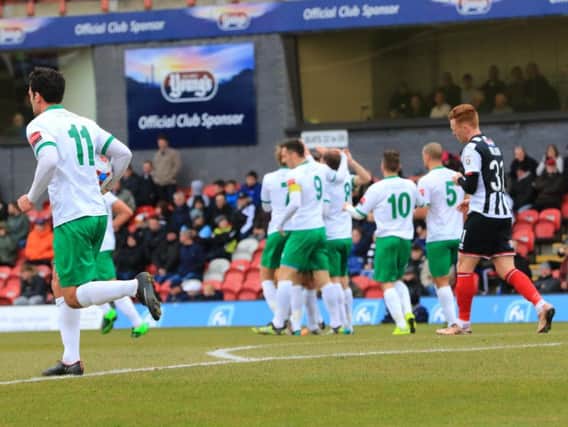 Bognor celebrate their goal in the FA Cup semi-final at Grimsby / Picture by Tim Hale