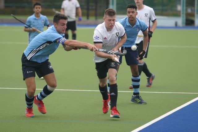 Ed Marsh in action for Horsham Hockey at home to Wycombe. Photo by Clive Turner