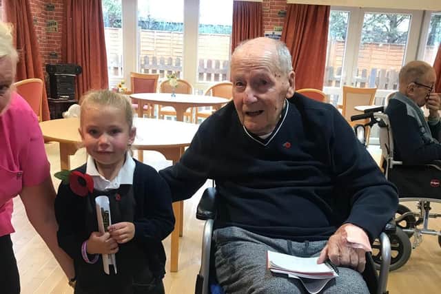 Tony Campbell, 96, and five-year-old Kayleigh May, who attends Beacon View Primary School, after the ceremony.
