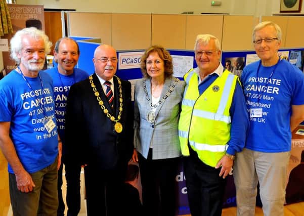 Burgess Hill mayor Chris Cherry and Mid Sussex District Council chairman Bruce Forbes with members of Burgess Hill District Lions Club and Prostate Cancer Support Organisation (PCaSO). Picture: Steve Robards