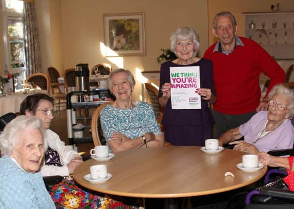 Residents from Red Oaks care home in Henfield held a coffee morning in aid of Macmillan Cancer Support SUS-181016-142145001