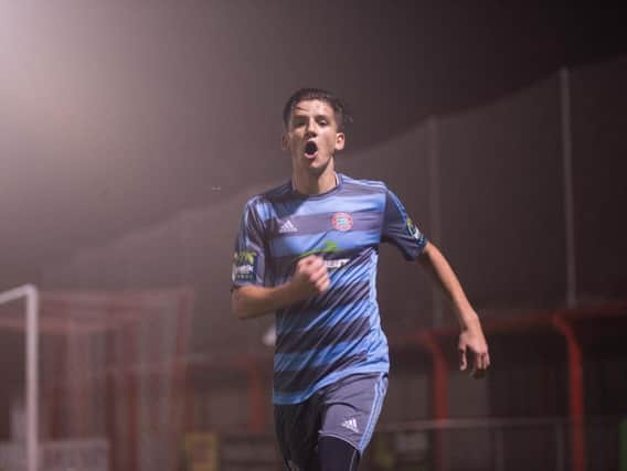 Ricky Aguiar celebrates his second goal last night. Picture by Marcus Hoare