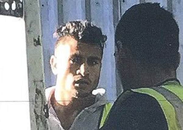 Police would like to identify these men in connection with a theft. Photo: Sussex Police