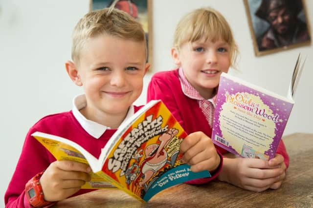 Young Readers Hereford
Picture for Citypress taken at Old Market Hereford
Local schools visiting Old Market Hereford as part of a joint iniiiitiative between British Land and the National Literacy Trust.
Pictured, Harvey Watkins and Bonnie Locke (both 7) SUS-181016-113826001