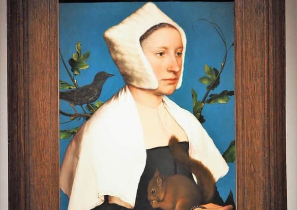 Hans Holbein the Youngers A Lady with a Squirrel and a Starling (Anne Lovell?)