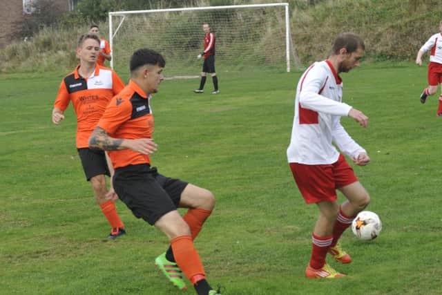 Sean Smith on the ball for Mountfield United against The JC Tackleway