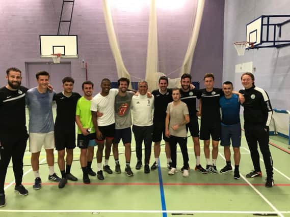 Aldo Dolcetti with his son Lorenzo (on his right), Chi City coach Danny Potter (on his left) and some of the other City squad members / Picture by Daniel Harker