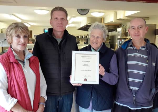 Anita, Mark, Sylvia and Keith; the garden volunteers with their most recent Horsham in Bloom award