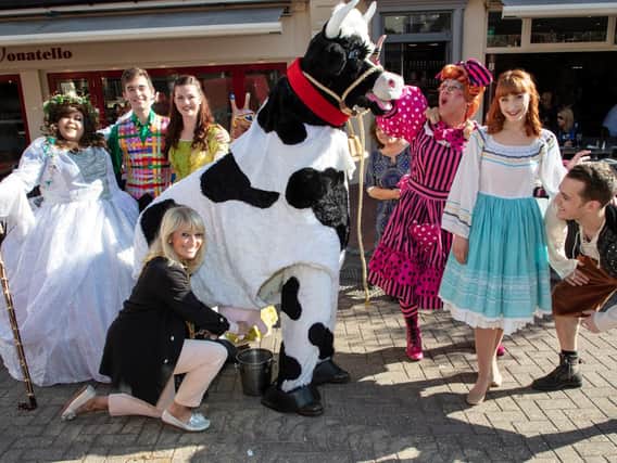 Mayor of Brighton and Hove Cllr. Dee Simson milking the pantomime cow!