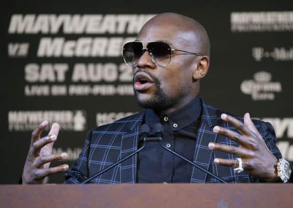 Floyd Mayweather Jr. speaks during a news conference Wednesday, Aug. 23, 2017, in Las Vegas. Mayweather is scheduled to fight Conor McGregor in a boxing match Saturday in Las Vegas. (AP Photo/John Locher) EMN-170825-101209002