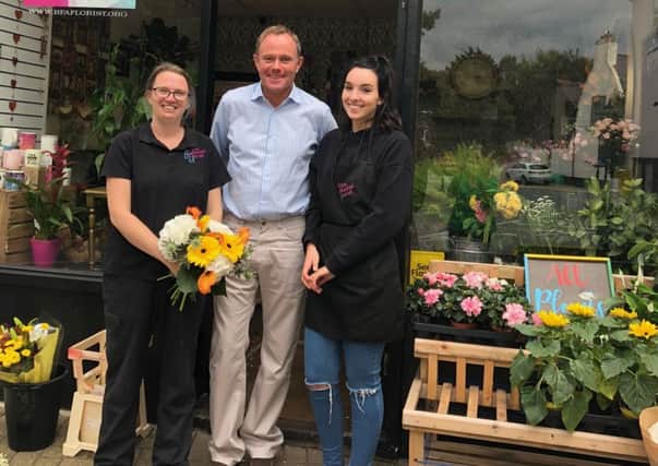 Arundel and South Downs MP Nick Herbert with Ellen Ford, left, and Clare Calder at The Enchanted Florist in Angmering