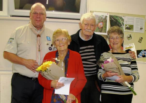 District commissioner Mark Hewson with, from left, Ruth Waterman, Stan Edson and Wendy Gregory