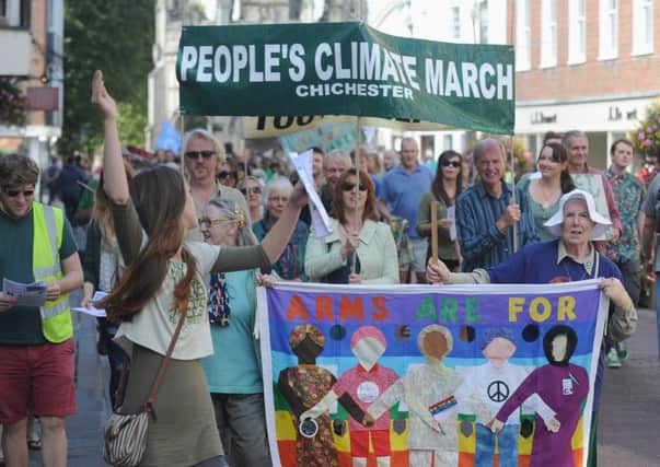 Climate change protestors in Chichester. 14LASEP21c-1 PPP-140921-191848006