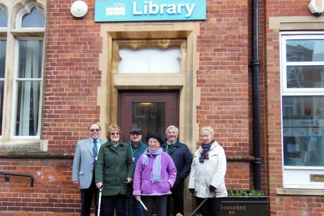 Cllrs Stuart Earl, Charles Clarke, Doug Oliver, and Deirdre Earl-Williams outside Bexhill Library with Lillian Hayes and Rosemary Dennes SUS-180328-120649001