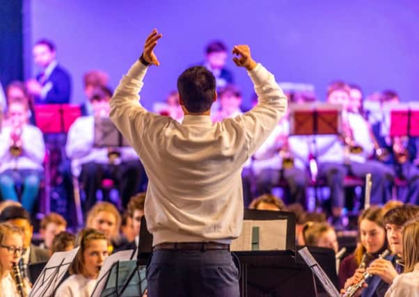 Conductor Richard Stafford in action. Picture by Andrew Hasson