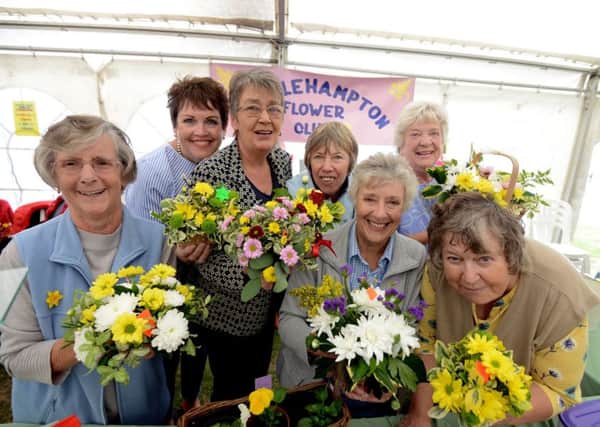 Littlehampton Flower Club members have been celebrating its diamond anniversary this year, including this stall at Littlehampton Town Show. Picture: Kate Shemilt ks180440-22