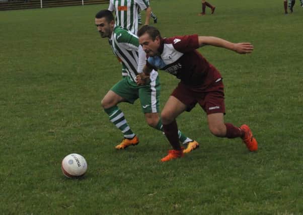 Action from Little Common's 2-0 defeat at home to Chichester City a fortnight ago. Picture by Simon Newstead
