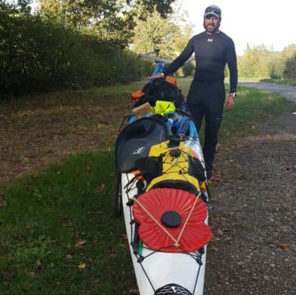 Dan Smith with his Paddle of Britain kayak and kit